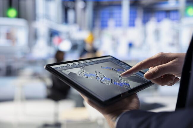 Specialist Uses Device Inspect Solar Plant Machinery Closeup